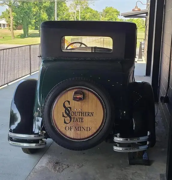 A car that is parked on the side of the road.